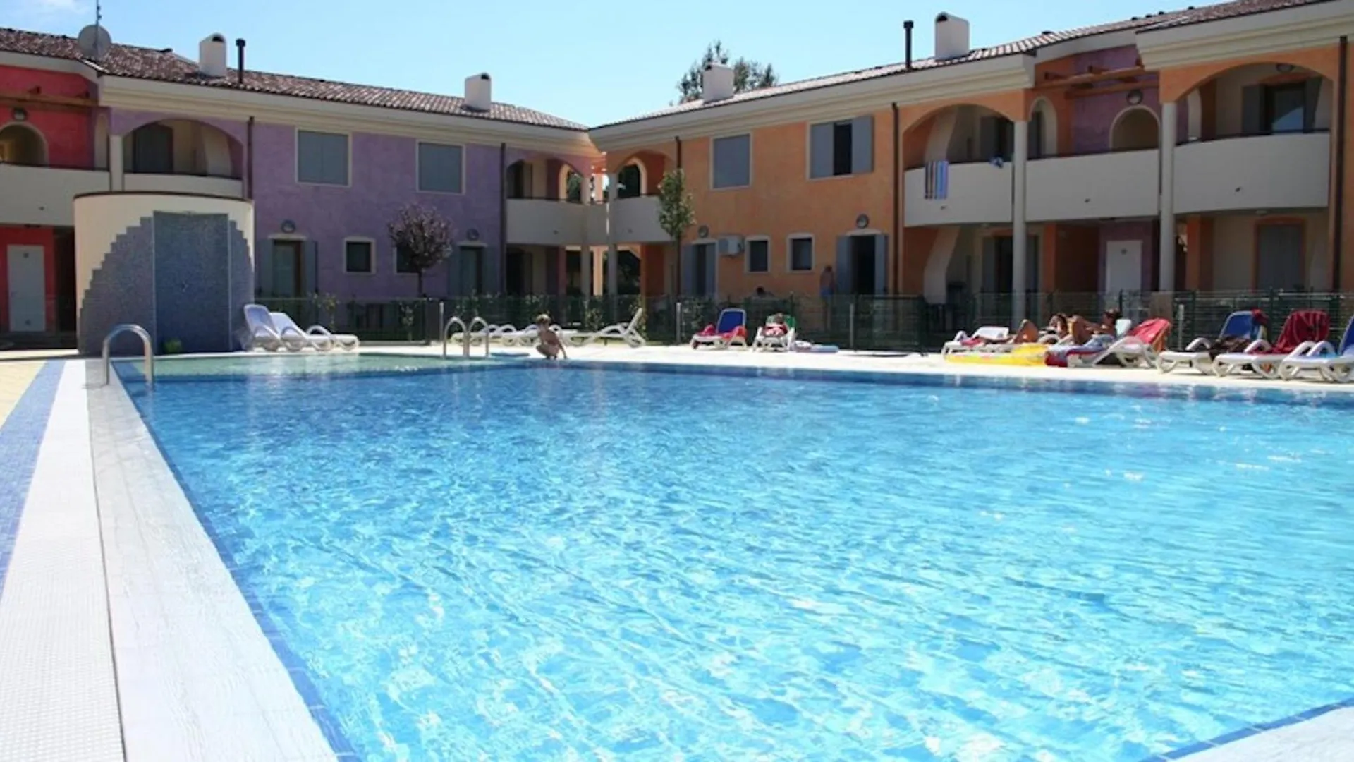 Colorful Apartment With Fenced Garden And Fireplace Bibione